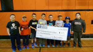 Marlboro Baseball accepting a donation