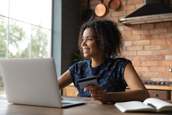 women on a laptop learning about financial education