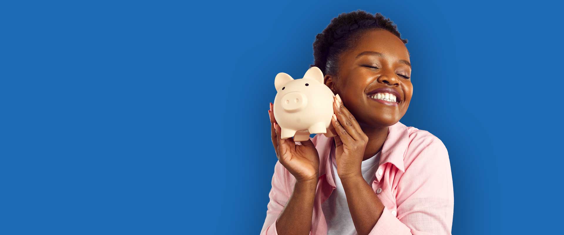Women with piggy bank happy bout high yield savings account